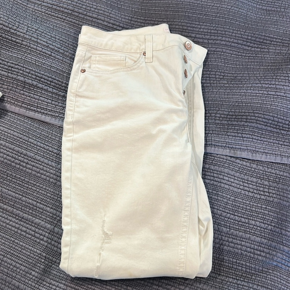 White Lauren Conrad, skinny ankle jeans. Button up, distressed.